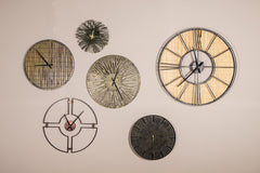 Masaka Grey metal wall clock roots design round