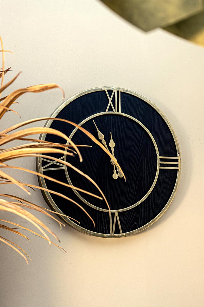 Resto Gold iron wallclock black veneer inlay round